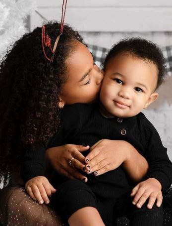 Hendrix Wilburn with his half older sister Shai.